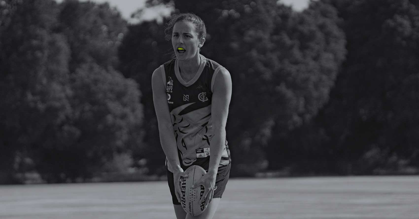 Football athlete wearing Lime Neomorph Mouthguard